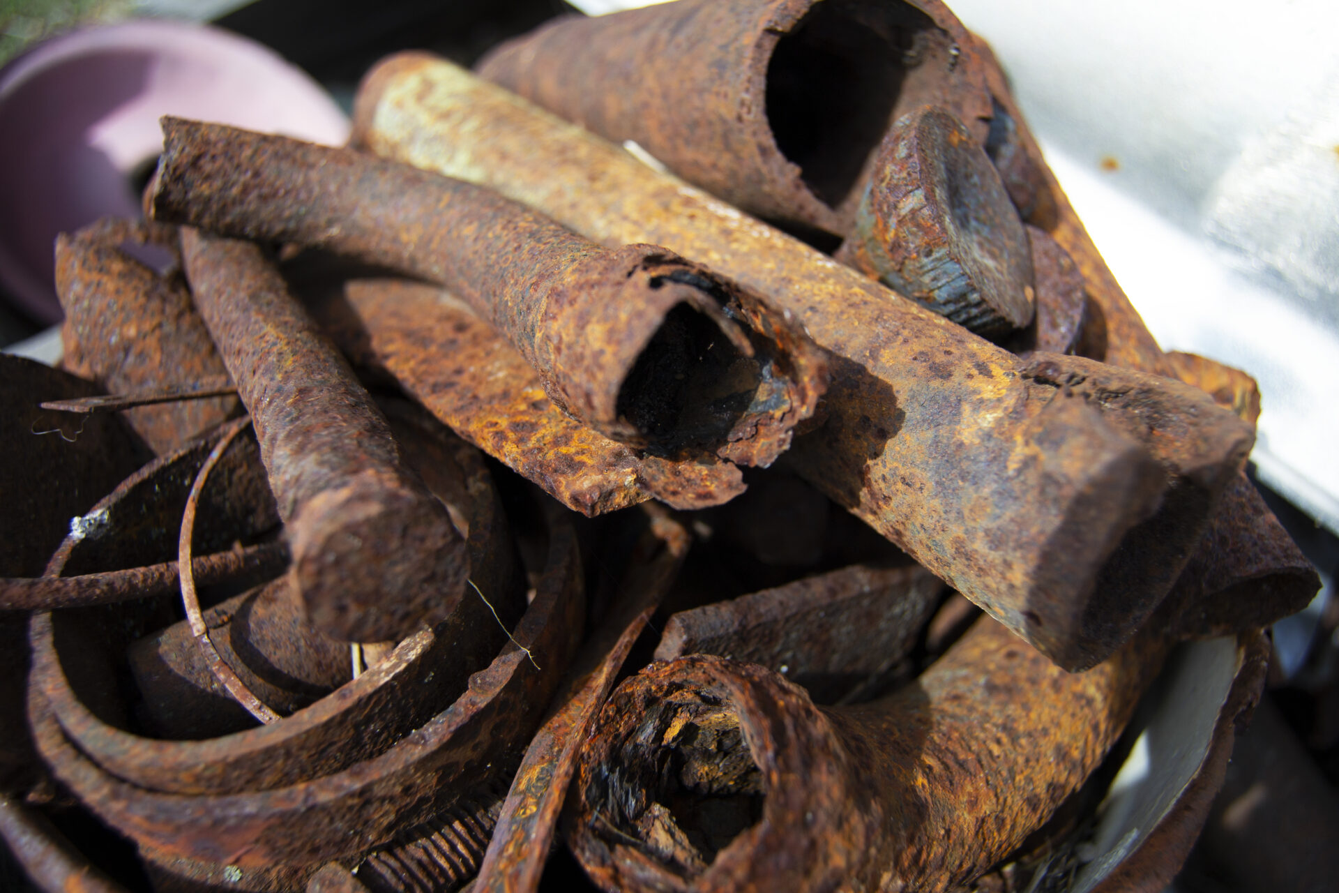 Dirty or rusted metal separate from other scrap metal