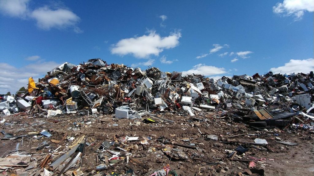 A pile of garbage in a dump site.
