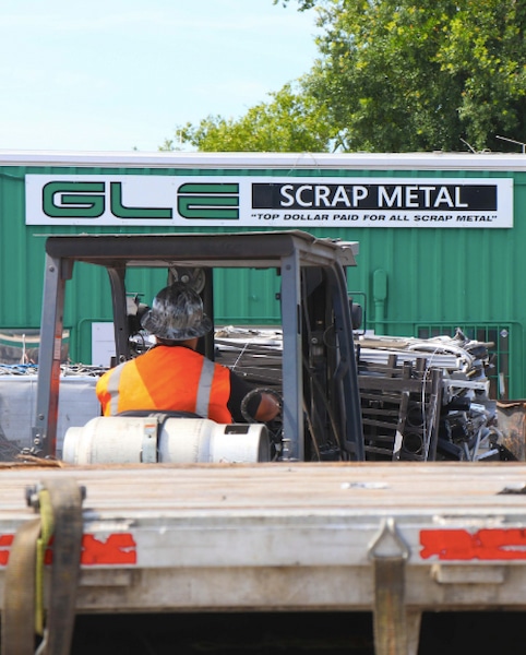 Salvage metal being moved at GLE Scrap Metal
